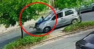 chocó y escapó con la víctima colgada en el capot de su auto